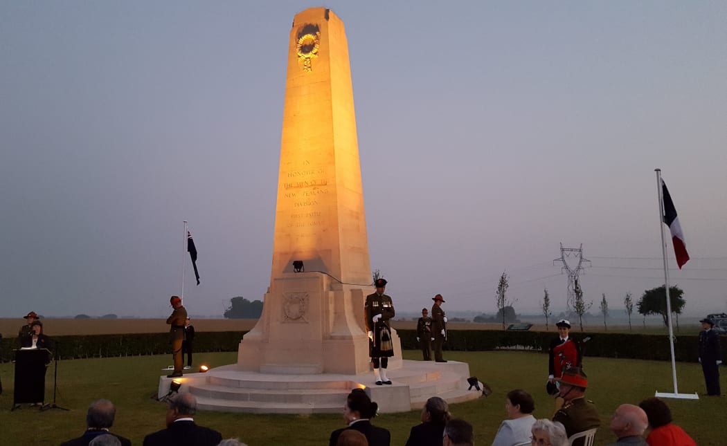 Obilisk war memorial at daybreak with guards and wreaths at Somme 100 year commemorations
