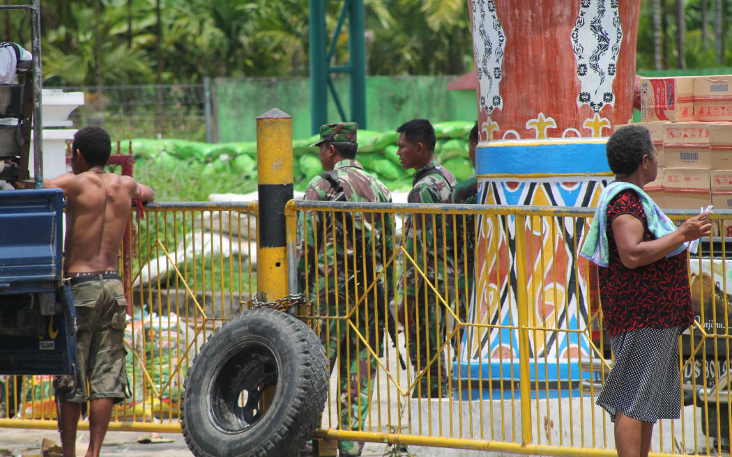 Indonesian military guard the border with Papua New Guinea