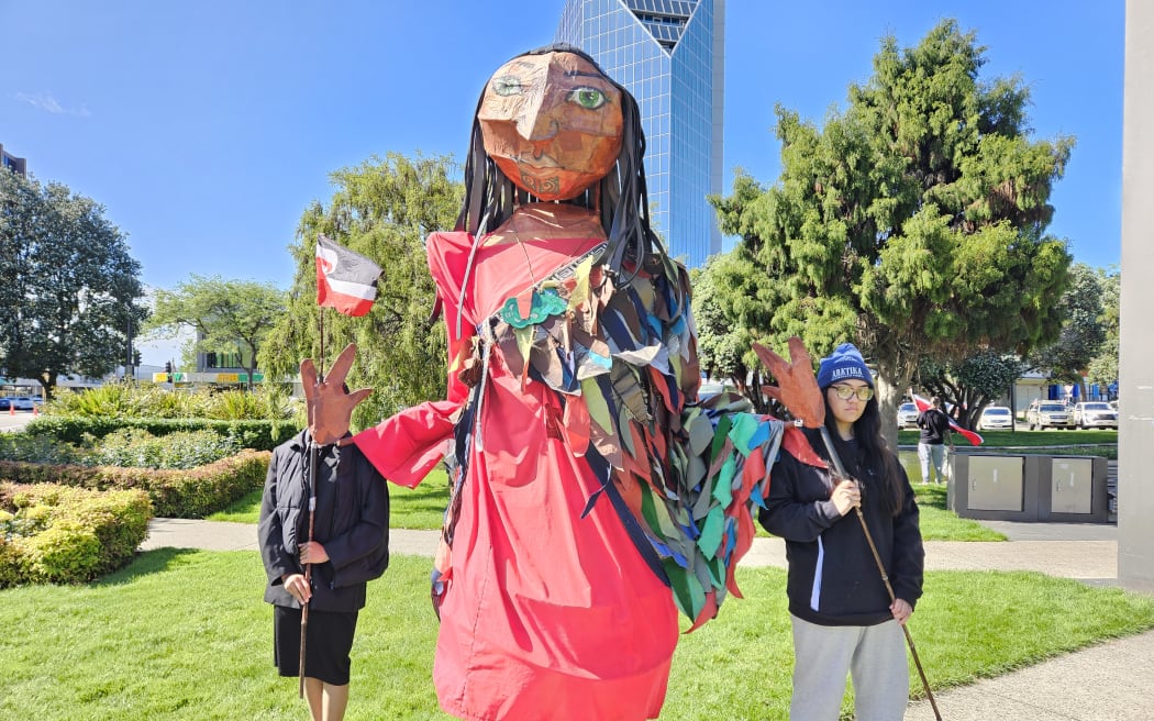 Some supporters of the hīkoi were crafty with their signs and fashion but one wahine took it to a new level creating 'Wahine o te Ao' over two days.