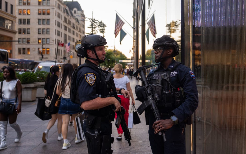 Law enforcement stand guard outside of Trump Tower in New York City, after Former President Donald Trump was injured when shots were fired at a rally in Pennsylvania on 13 July, 2024.