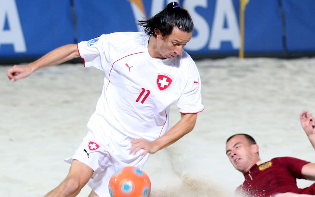 Tahiti coach Angelo Schirinzi (L) in possession during the 2009 Beach Soccer World Cup.