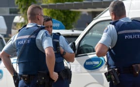 QUEENSTOWN, NZ - JAN 18:NZ Policemen on duty on Jan 18 2014. With over 11,000 staff it is the largest law enforcement agency in New Zealand.