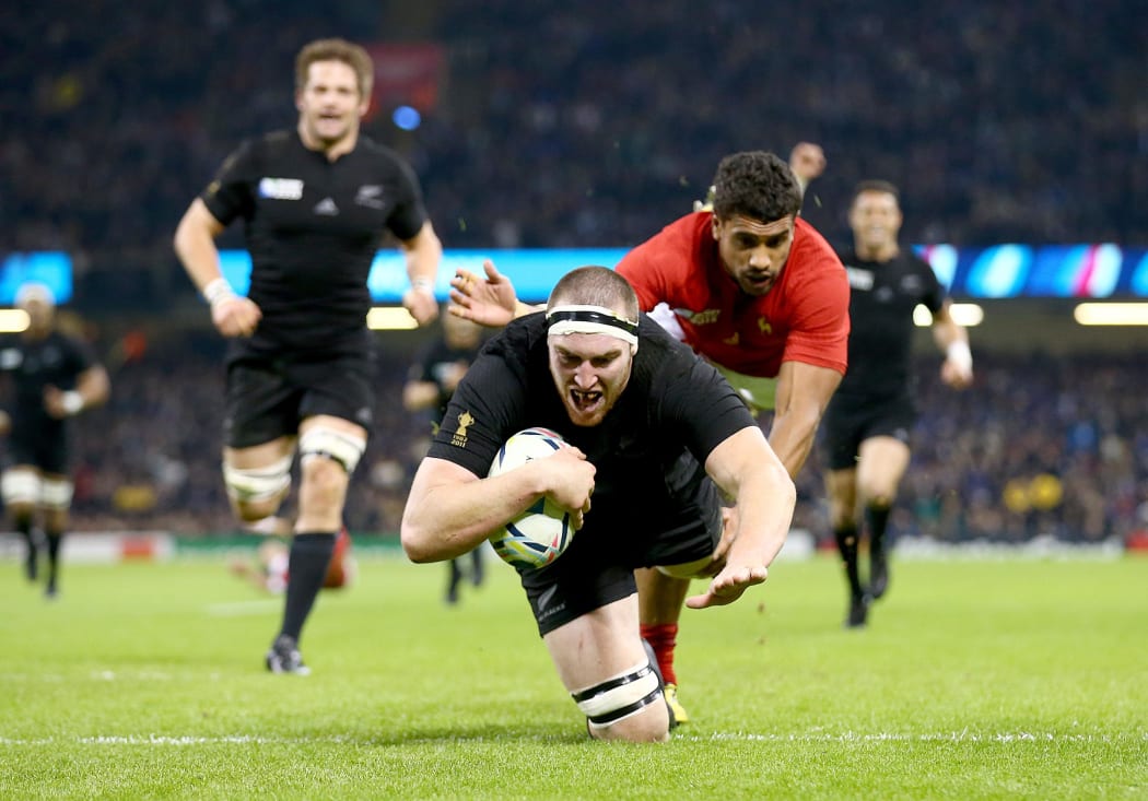 All Black lock Brodie Retallick scores the first try of the match during the 2015 Rugby World Cup Quarter Final against France in Cardiff.