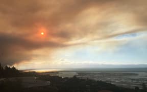 Ash is falling in Atawhai, north of Nelson City from a forest fire in Tasman.