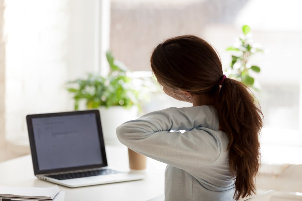 Office worker, neck pain, fatigue.