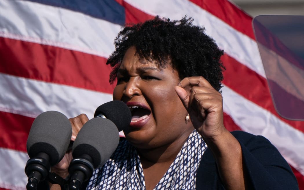 Former US Representative and voting rights activist Stacey Abrams speaks at a Get Out the Vote rally with former US President Barack Obama as he campaigns for Democratic presidential candidate former Vice President Joe Biden on November 2, 2020, in Atlanta, Georgia.