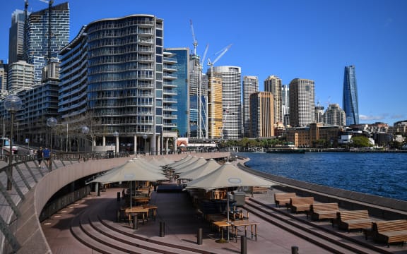 This picture shows a closed restaurant next to the harbour in Sydney on June 26, 2021, after authorities locked down several central areas of Australia's largest city to contain an outbreak of the highly contagious Delta variant