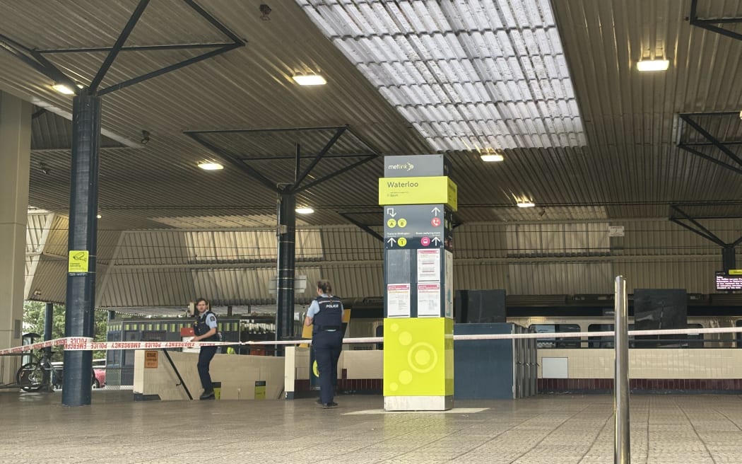 Emergency tape blocking the entrances to Lower Hutt’s Waterloo Station. Police officers are stationed.