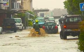 Flooded street in French Polynesia’s Fare Ute on 12 February 2024.