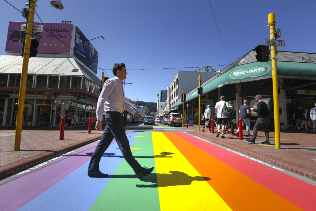 Wellington Major Justin Lester crossing the new rainbow crossing, Cuba Street in Wellington.