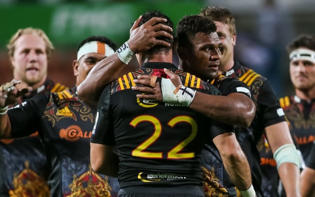 Chiefs centre Seta Tamanivalu hugs Chiefs replacement Stephen Donald after his successful shot at goal during their Super Rugby game vs Western Force at FMG Stadium, Hamilton, on Saturday 26 March 2016.
