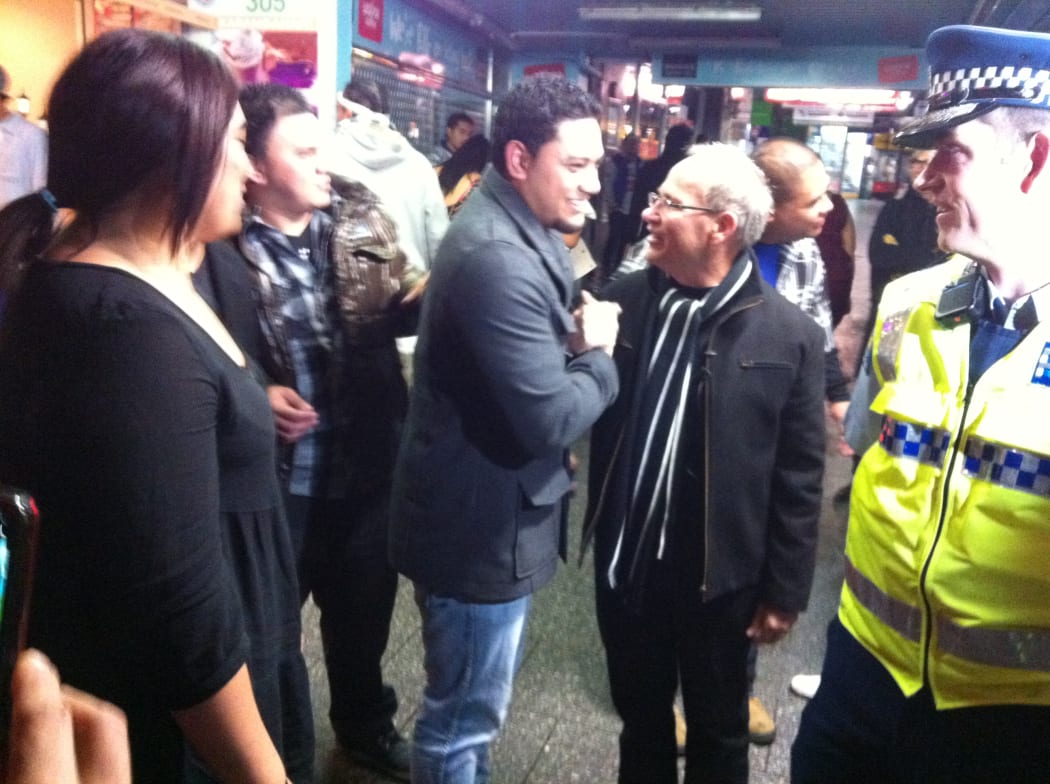 Post-midnight mingling by Mayor Len Brown with some constituents.