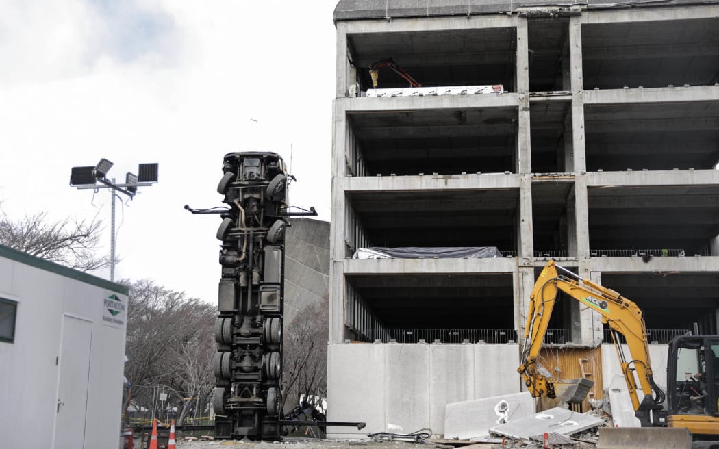 A truck has tipped up on its end outside the New Zealand Campus of Innovation and Sport in Upper Hutt.