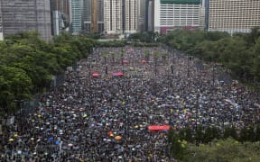 Protesters gather for a rally in Victoria Park in Hong Kong on Sunday in the latest opposition to a planned extradition law that has since widened into a call for democratic rights in the semi-autonomous city.