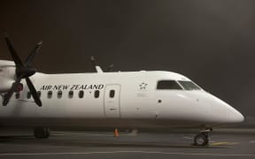 A regional Air New Zealand plane grounded at Auckland Airport due to fog. 6 July 2016.