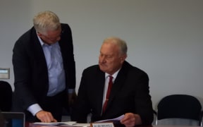 Frank Dooley (left) talks to Allan Birchfield about the rates issue at West Coast Regional Council, shortly before tensions flared.