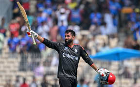 Canada's Yuvraj Samra celebrates after scoring a century against New Zealand at the 2026 T20 World Cup.