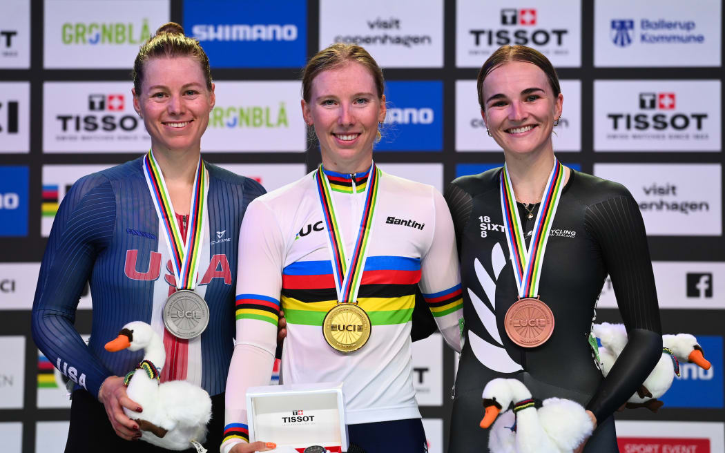 Women's Scratch Race Podium - Lorena Wiebes (Netherlands) on the podium receiving the Gold Medal with Jennifer Valente (USA) receiving the Silver Medal with Ally Wollaston (New Zealand) receiving the bronze. 2024 Track Cycling World Champs, Denmark. Picture by Simon Wilkinson/SWpix.com.