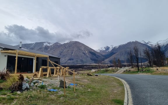 Rebuilding a year after the fire that swept through Lake Ōhau alpine village.