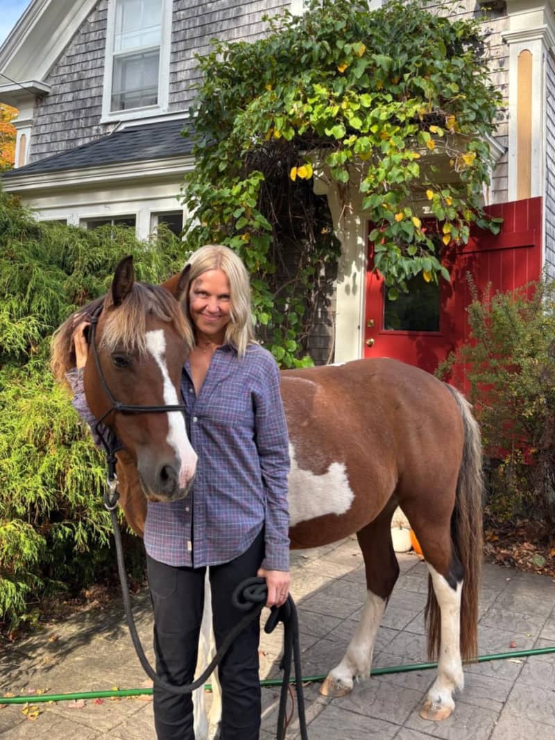 Author Amelia Thomas with her horse