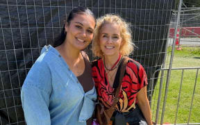Jordan with a Why and Mihi Forbes catchup at the 2026 Pasifika Festival in Western Springs, Auckland.