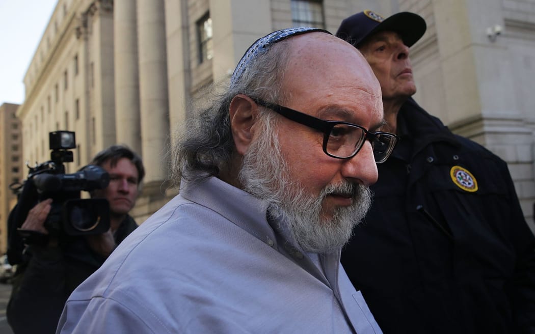 Former US Navy intelligence analyst Jonathan Pollard, who spied for Israel, leaves a New York court house after his release from prison early on Friday after 30 years on November 20, 2015 in New York, New York.