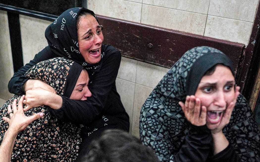 Women react outside the trauma ward after a child relative being treated there died in the aftermath of bombardment on their displaced persons camp, at the Aqsa Martyrs Hospital in Deir el-Balah in the central Gaza Strip on May 11, 2024 amid the ongoing conflict in the Palestinian territory between Israel and Hamas.