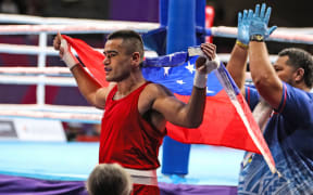 Samoan boxer Ato Leau Plodzicki-Faoagali after winning a gold medal at the 2022 Birmingham Commonwealth Games.