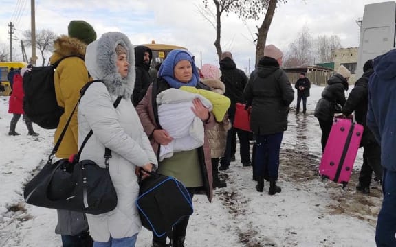 SUMY, UKRAINE - MARCH 8: (----EDITORIAL USE ONLY â MANDATORY CREDIT - "UKRAINIAN PRESIDENCY / HANDOUT" - NO MARKETING NO ADVERTISING CAMPAIGNS - DISTRIBUTED AS A SERVICE TO CLIENTS----) Civilians flee the city after temporary ceasefire announced on March 8, 2022 in Sumy, Ukraine.