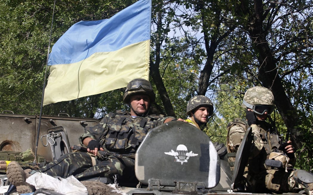 Ukrainian soldiers patrol in the Donetsk region.