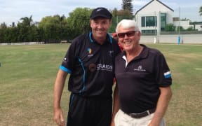 Stephen Hewson being presented with his cap by South African great Barry Richards.
