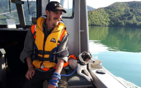 Rodent detector dog Flint with his handler Richard Johnston.