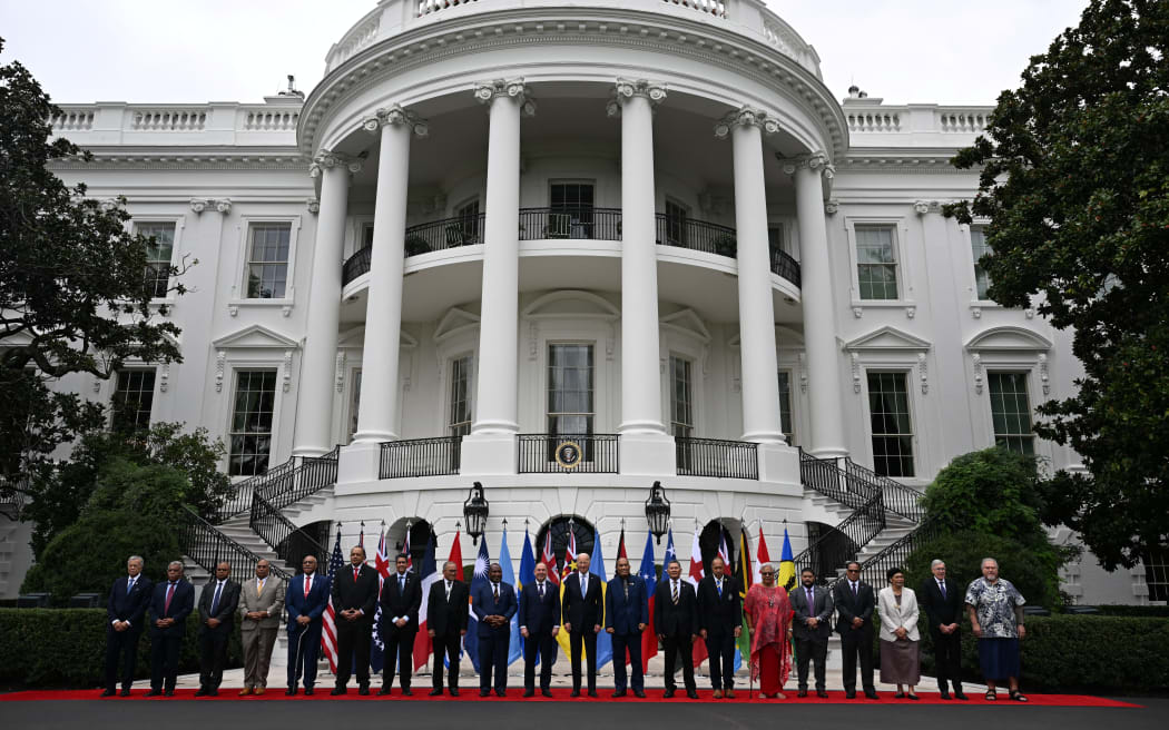 US President Joe Biden (C) stands for a group photo with Pacific Islands Forum leaders following the Pacific Islands Forum (PIF) Summit, at the South Portico of the White House in Washington, DC, on September 25, 2023 (Photo by Jim WATSON / AFP)