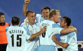 Mark Rudan (Centre) celebrating a goal with Sydney FC