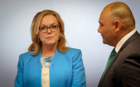 Judith Collins (left) and Sam Lotu-Iiga (right) talking before Ms Collins's re-appointment as a Minister 14.12.15.