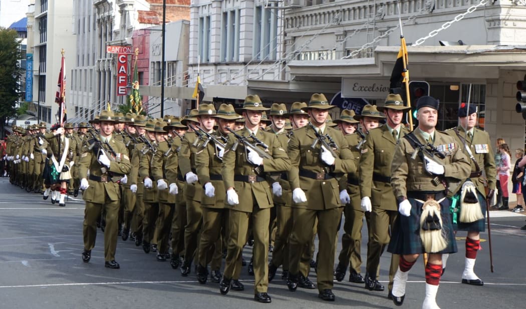 The parade makes its way through Dunedin.