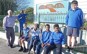Balclutha Primary School principal Paddy Ford with students Nadia Asman, 9, Ciaran Derwen, 10, Laila Asman, 11, Rishav Prasard, 12, Muhammed Mustaneer, 12, and George Ouyang, 10