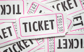 Multiple white color paper show tickets in pile