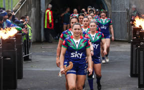 Apii Nicholls (captain) of the Warriors leads her team out, One New Zealand Warriors Women v Parramatta Eels Women.