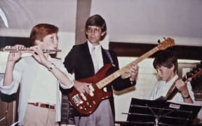 Nathan Haines playing with his dad Kevin and younger brother Joel