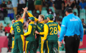 South Africa celebrate a wicket against West Indies on 16 January in Durban.