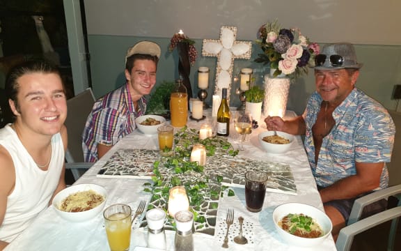 Annette Janes' and family during a themed dinner.