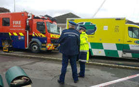Emergency services can be seen outside the property in Lower Hutt.