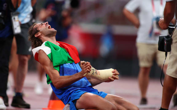Gianmarco Tamberi wins a gold in the high jump.