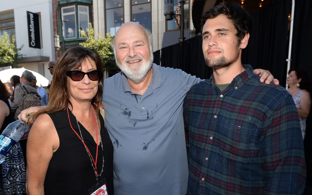 Actor/Producer/Director Rob Reiner (center) and wife Michele Singer (L) and son Nick Reiner (R) attend Teen Vogue's Back-to-School Saturday kick-off event at The Grove on August 9, 2013 in Los Angeles, California.