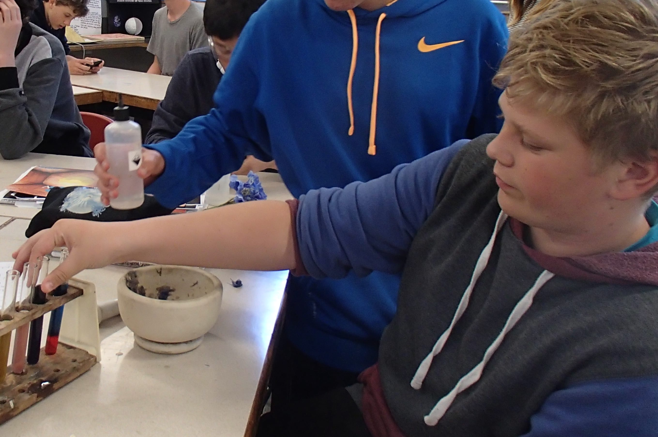 Year 10 students at Onslow College carrying out their experiment with acids and bases.