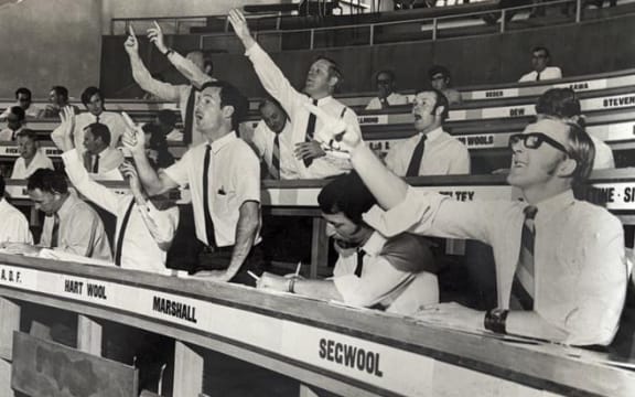 Buyers bidding at auction at the Napier Wool Exchange in the 1960s.