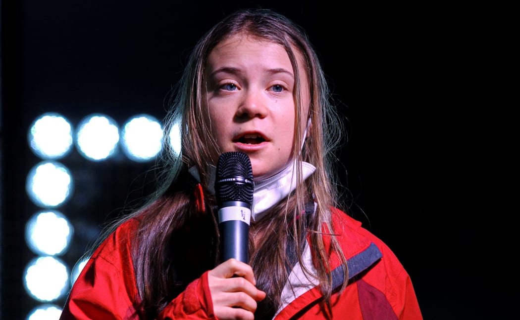 Friday for Future Climate activist Greta Thunberg takes part in a climate protest as they march though the city centre on November 05, 2021 in Glasgow, Scotland.