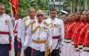 Ratu Naiqama Lalabalavu, center, receives a guard of honour by the Fiji Military Forces at the opening of the 2025 parliamentary session in Suva. 24 February 2025.