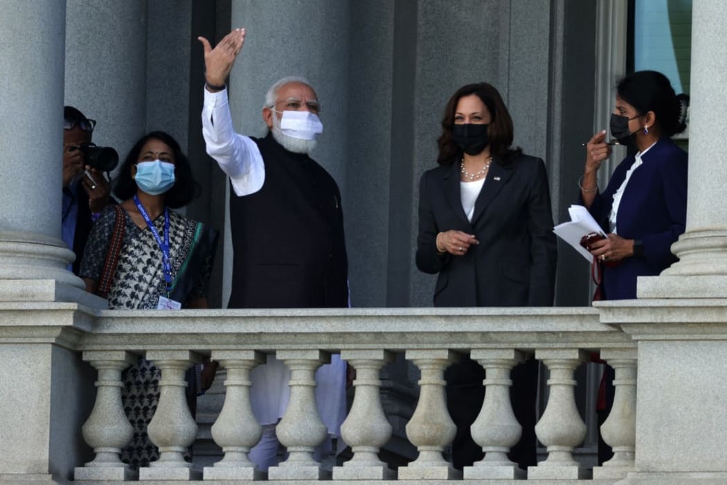 U.S. Vice President Kamala Harris and Indian Prime Minister Narendra Modi tour the balcony outside the Vice President's ceremonial office at Eisenhower Executive Office Building during a meeting 23 September, 2021 in Washington, DC.